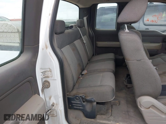 2009 Ford F-150 STX with VIN 1FTRX12W59KB75341, listed as a IAAI auction lot 42045577 with 195,427 mi miles and . Bid and sale history available at DreamBid. Image 8.