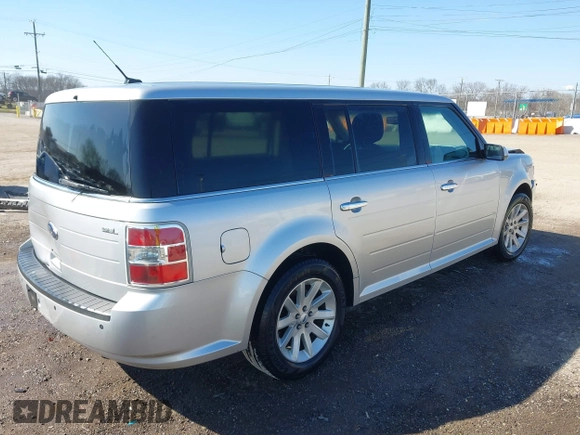 2011 Ford Flex SEL with VIN 2FMGK5CC5BBD28698, listed as a IAAI auction lot 41774174 with 306,974 mi miles. Bid and sale history available at carsss.com. Image 4.