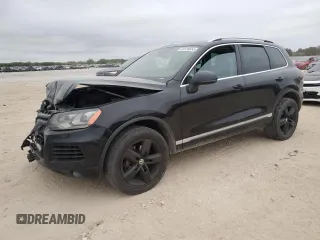 2013 Volkswagen Touareg Lux with VIN WVGEF9BP7DD005872, listed as a Copart auction lot 82618654 with 236,650 mi miles and Salvage Title. Bid and sale history available at DreamBid. Image 1.