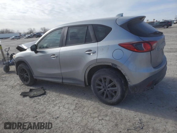 2015 Mazda CX-5 Touring with VIN JM3KE4CY4F0467571, listed as a Copart auction lot 88919035 with 197,755 mi miles and Salvage Title. Bid and sale history available at carsss.com. Image 2.