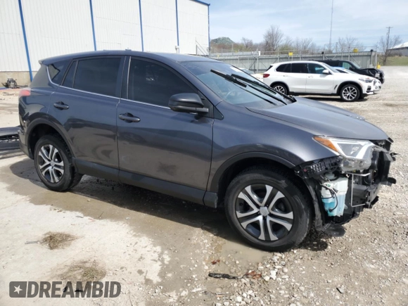 2018 Toyota RAV4 LE with VIN JTMBFREV0JJ235414, listed as a Copart auction lot 49786995 with 70,153 mi miles and Salvage Title. Bid and sale history available at DreamBid. Image 4.