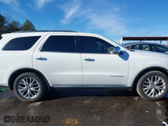 2015 Dodge Durango Citadel with VIN 1C4RDHEG4FC729108, listed as a IAAI auction lot 41340776 with 211,806 mi miles and . Bid and sale history available at DreamBid. Image 14.