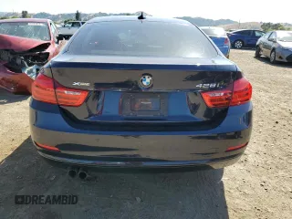 2016 BMW 4 Series 428i xDrive z VIN WBA4C9C55GG140032, wystawiony jako Copart lot #57702215 z przebiegiem 57 050 mil mil oraz Szkoda całkowita • Salvage title. Historia ofert i sprzedaży dostępna na DreamBid. Obrazek 6.
