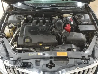 2012 Lincoln MKZ с VIN 3LNHL2JC2CR818635, выставлен на аукционе Copart как лот 59057485 с пробегом 145 230 миль миль и Чистый • Clean title. История ставок и продаж доступна на DreamBid. Изображение 11.