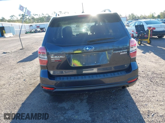 2014 Subaru Forester 2.5i Touring with VIN JF2SJAMC1EH452856, listed as a IAAI auction lot 41801406 with 148,342 mi miles. Bid and sale history available at carsss.com. Image 16.