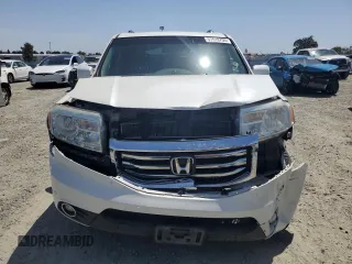 2014 Honda Pilot Touring z VIN 5FNYF4H9XEB047993, wystawiony jako Copart lot #57518705 z przebiegiem 159 809 mil mil oraz Szkoda całkowita • Salvage title. Historia ofert i sprzedaży dostępna na DreamBid. Obrazek 5.