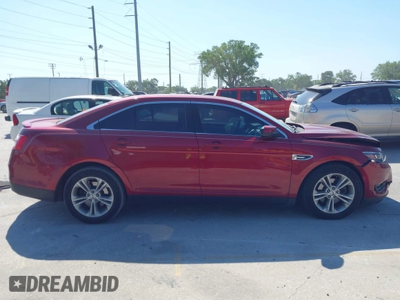 2014 Ford Taurus SEL with VIN 1FAHP2E86EG186642, listed as a IAAI auction lot 41901768 with 106,057 mi miles. Bid and sale history available at carsss.com. Image 13.