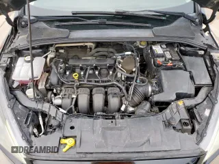 2015 Ford Focus SE z VIN 1FADP3F29FL357021, wystawiony jako Copart lot #57985125 z przebiegiem 142 786 mil mil oraz Szkoda całkowita • Salvage title. Historia ofert i sprzedaży dostępna na DreamBid. Obrazek 11.