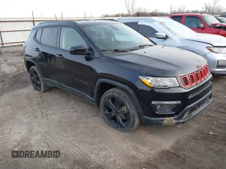 2020 Jeep Compass Latitude with VIN 3C4NJDBB9LT137387, listed as a IAAI auction lot 41379552 with 79,083 mi miles and . Bid and sale history available at carsss.com. Image 1.