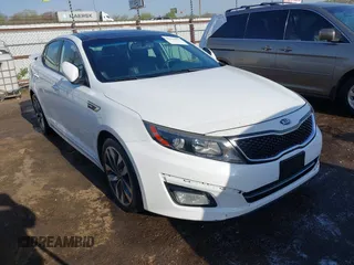 2015 Kia Optima SX Turbo with VIN 5XXGR4A65FG488237, listed as a IAAI auction lot 41978359 with 157,216 mi miles and . Bid and sale history available at DreamBid. Image 1.