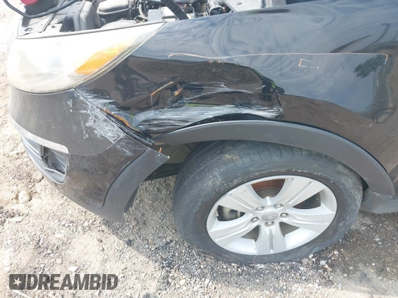 2012 Kia Sportage LX with VIN KNDPB3A28C7337795, listed as a IAAI auction lot 40118771 with 187,037 mi miles and . Bid and sale history available at DreamBid. Image 6.