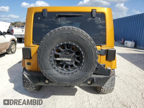 2014 Jeep Wrangler Unlimited Rubicon X with VIN 1C4HJWFGXEL167737, listed as a Copart auction lot 77240414 with 97,721 mi miles and Non repairable. Bid and sale history available at DreamBid. Image 6.