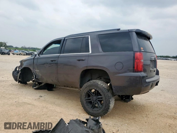 2015 Chevrolet Tahoe LT with VIN 1GNSKBKC1FR139281, listed as a Copart auction lot 57583595 with 142,090 mi miles and Salvage title. Bid and sale history available at DreamBid. Image 2.