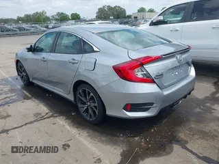 2021 Honda Civic Sport with VIN 2HGFC2F88MH530214, listed as a IAAI auction lot 41968361 with 60,869 mi miles and . Bid and sale history available at DreamBid. Image 3.