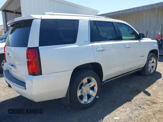 2016 Chevrolet Tahoe LTZ z VIN 1GNSKCKC8GR451685, wystawiony jako IAAI lot #42028917 z przebiegiem 73 398 mil mil oraz . Historia ofert i sprzedaży dostępna na DreamBid. Obrazek 4.