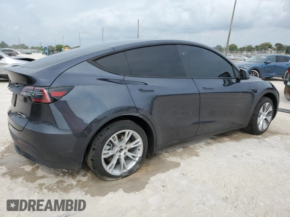 2024 Tesla Model Y Long Range with VIN 7SAYGDEE3RA253354, listed as a Copart auction lot 50524105 with 10,353 mi miles and Salvage Title. Bid and sale history available at DreamBid. Image 3.