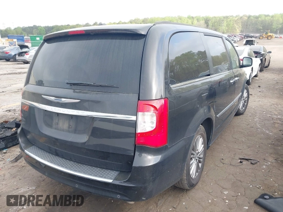 2014 Chrysler Town & Country Touring-L with VIN 2C4RC1CG5ER347141, listed as a IAAI auction lot 41948572 with 133,495 mi miles. Bid and sale history available at carsss.com. Image 4.