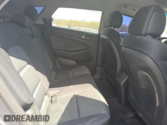 2018 Hyundai Tucson SE z VIN KM8J2CA49JU792947, wystawiony jako Copart lot #52633895 z przebiegiem 75 690 mil mil oraz Tytuł czysty. Historia ofert i sprzedaży dostępna na DreamBid. Obrazek 11.