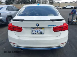 2017 BMW 3 Series 330e iPerformance with VIN WBA8E1C51HK895223, listed as a IAAI auction lot 41492625 with 116,486 mi miles. Bid and sale history available at carsss.com. Image 16.