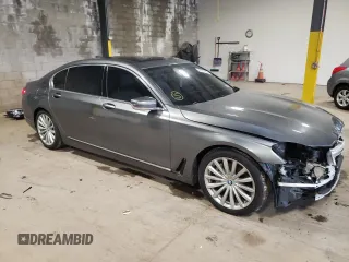 2018 BMW 7 Series 740i xDrive with VIN WBA7E4C5XJGV24275, listed as a Copart auction lot 48987063 with 48,864 mi miles. Bid and sale history available at carsss.com. Image 4.