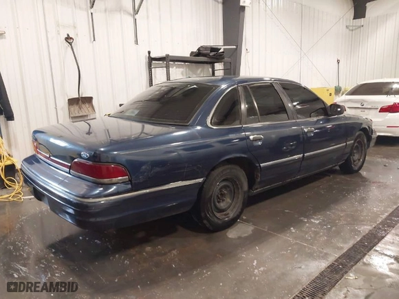 1994 Ford Crown Victoria with VIN 2FALP73W7RX115913, listed as a IAAI auction lot 41899751 with 159,361 mi miles. Bid and sale history available at carsss.com. Image 4.
