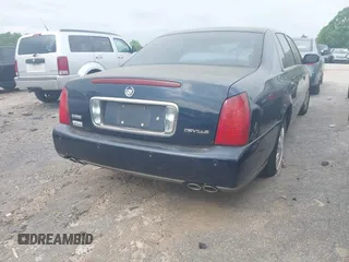 2004 Cadillac DeVille z VIN 1G6KD54Y74U236897, wystawiony jako IAAI lot #42058904 z przebiegiem 75 226 mil mil oraz . Historia ofert i sprzedaży dostępna na DreamBid. Obrazek 4.