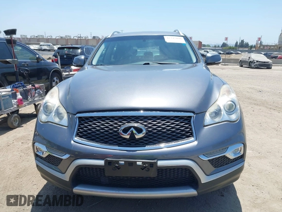 2016 Infiniti QX50 z VIN JN1BJ0RP3GM232412, wystawiony jako IAAI lot #42345098 z przebiegiem 88 865 mil mil oraz . Historia ofert i sprzedaży dostępna na DreamBid. Obrazek 13.