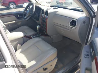 2006 GMC Envoy SLT with VIN 1GKDS13S062128531, listed as a IAAI auction lot 41458983 with 119,385 mi miles. Bid and sale history available at carsss.com. Image 5.