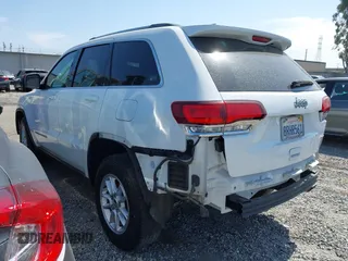 2020 Jeep Grand Cherokee Altitude with VIN 1C4RJEAG3LC202749, listed as a IAAI auction lot 42272959 with 90,698 mi miles and . Bid and sale history available at DreamBid. Image 3.