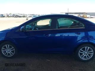 2012 Chevrolet Sonic LT with VIN 1G1JC5SH1C4184320, listed as a IAAI auction lot 42101145 with 207,735 mi miles and . Bid and sale history available at DreamBid. Image 13.