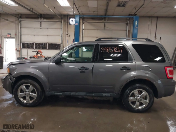 2011 Ford Escape XLT with VIN 1FMCU9D73BKB81871, listed as a IAAI auction lot 39857267 with 75,273 mi miles. Bid and sale history available at carsss.com. Image 14.