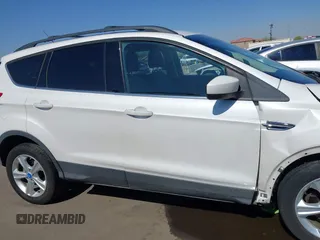 2013 Ford Escape SE with VIN 1FMCU0GX9DUB83638, listed as a IAAI auction lot 42471869 with 213,356 mi miles and . Bid and sale history available at DreamBid. Image 14.