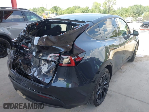 2024 Tesla Model Y Long Range z VIN 7SAYGDEE7RA229591, wystawiony jako IAAI lot #42194044 z przebiegiem 22 866 mil mil oraz . Historia ofert i sprzedaży dostępna na DreamBid. Obrazek 4.