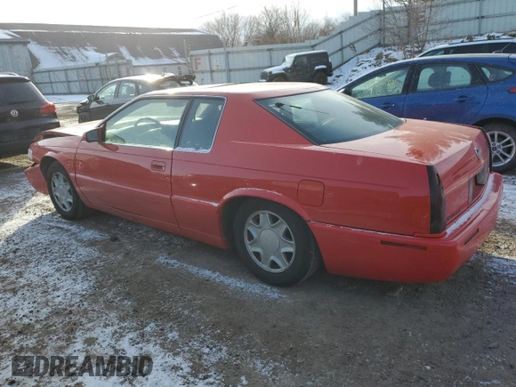 2002 Cadillac Eldorado z VIN 1G6EC12972B106132, wystawiony jako Copart lot #86799624 z przebiegiem 75 334 mil mil oraz Szkoda całkowita • Salvage title. Historia ofert i sprzedaży dostępna na DreamBid. Obrazek 2.