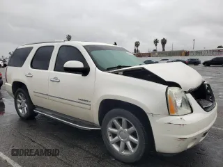 2011 GMC Yukon Denali with VIN 1GKS1EEF2BR337370, listed as a Copart auction lot 49311105 with 131,840 mi miles and Salvage Title. Bid and sale history available at carsss.com. Image 4.