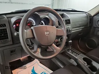 2011 Dodge Nitro SE z VIN 1D4PT2GK2BW589063, wystawiony jako IAAI lot #42408917 z przebiegiem 160 504 mil mil oraz . Historia ofert i sprzedaży dostępna na DreamBid. Obrazek 54.