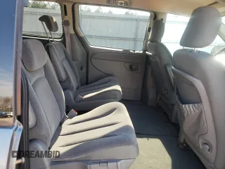 2005 Dodge Caravan SXT z VIN 2D4GP44L75R504132, wystawiony jako Copart lot #50805745 z przebiegiem 214 532 mil mil oraz Czysty tytuł • Clean title. Historia ofert i sprzedaży dostępna na DreamBid. Obrazek 11.