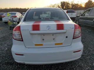 2010 Suzuki SX4 LE with VIN JS2YC5A24A6301771, listed as a Copart auction lot 83049774 with 165,033 mi miles and Salvage Title. Bid and sale history available at carsss.com. Image 6.