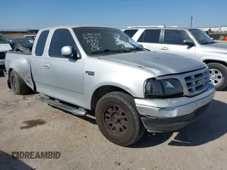 2003 Ford F-150 XL with VIN 1FTRX07W83KB40268, listed as a IAAI auction lot 42009163 with 243,836 mi miles and . Bid and sale history available at DreamBid. Image 1.