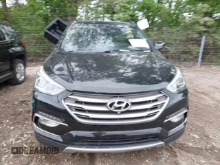 2017 Hyundai Santa Fe 2.4L z VIN 5XYZU3LB2HG434503, wystawiony jako IAAI lot #42197574 z przebiegiem 99 167 mil mil oraz . Historia ofert i sprzedaży dostępna na DreamBid. Obrazek 13.