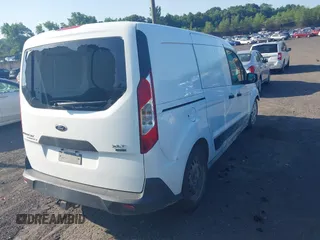 2015 Ford Transit Connect with VIN NM0LE7FX9F1181448, listed as a IAAI auction lot 42546908 with 136,922 mi miles and . Bid and sale history available at DreamBid. Image 4.