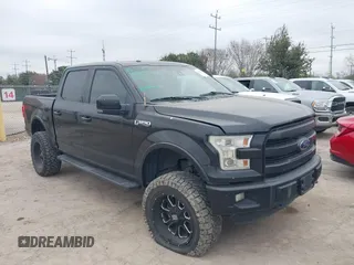 2015 Ford F-150 XLT with VIN 1FTEW1EF6FKE36971, listed as a IAAI auction lot 41338217 with 141,518 mi miles. Bid and sale history available at carsss.com. Image 1.