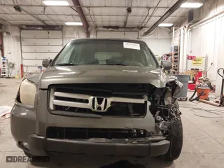 2007 Honda Pilot EX-L with VIN 2HKYF187X7H528523, listed as a IAAI auction lot 40977045 with 139,463 mi miles. Bid and sale history available at carsss.com. Image 6.