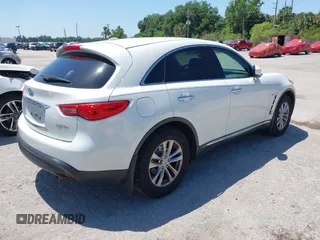 2014 Infiniti QX70 with VIN JN8CS1MU7EM451098, listed as a IAAI auction lot 42026803 with 126,605 mi miles and . Bid and sale history available at DreamBid. Image 4.