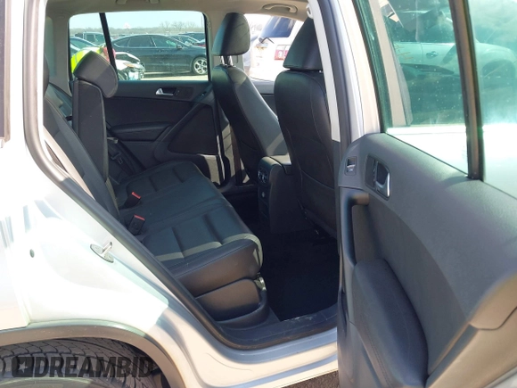 2013 Volkswagen Tiguan SE with VIN WVGAV7AX4DW545658, listed as a IAAI auction lot 41523168 with 188,729 mi miles and . Bid and sale history available at DreamBid. Image 8.