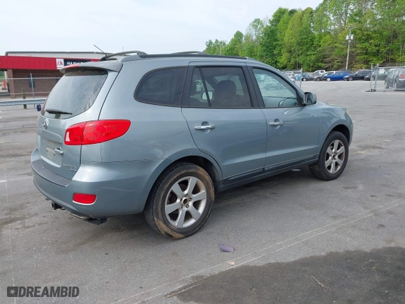 2009 Hyundai Santa Fe SE with VIN 5NMSH13E09H311908, listed as a IAAI auction lot 42098472 with 262,187 mi miles. Bid and sale history available at carsss.com. Image 4.
