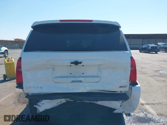 2017 Chevrolet Tahoe LT with VIN 1GNSKBKC4HR356570, listed as a IAAI auction lot 42762093 with 146,679 mi miles and . Bid and sale history available at DreamBid. Image 17.
