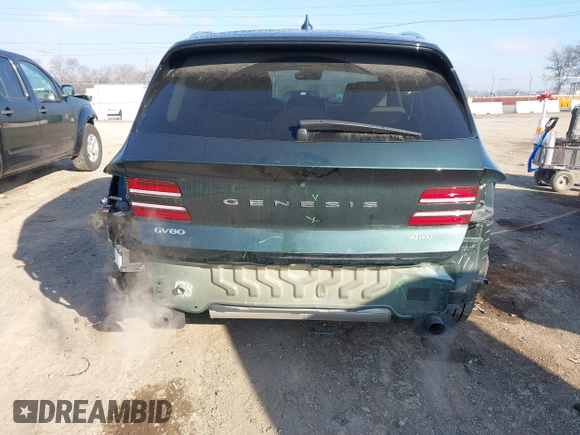 2021 Genesis GV80 with VIN KMUHCESCXMU031136, listed as a IAAI auction lot 41297818 with 31,890 mi miles and . Bid and sale history available at DreamBid. Image 6.
