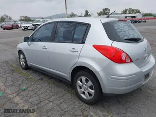 2009 Nissan Versa 1.8 S with VIN 3N1BC13E09L406828, listed as a IAAI auction lot 42075391 with 136,671 mi miles. Bid and sale history available at carsss.com. Image 3.