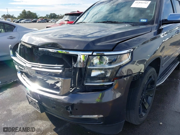 2015 Chevrolet Tahoe LTZ with VIN 1GNSCCKC8FR617540, listed as a IAAI auction lot 41356342 with 118,268 mi miles. Bid and sale history available at carsss.com. Image 17.
